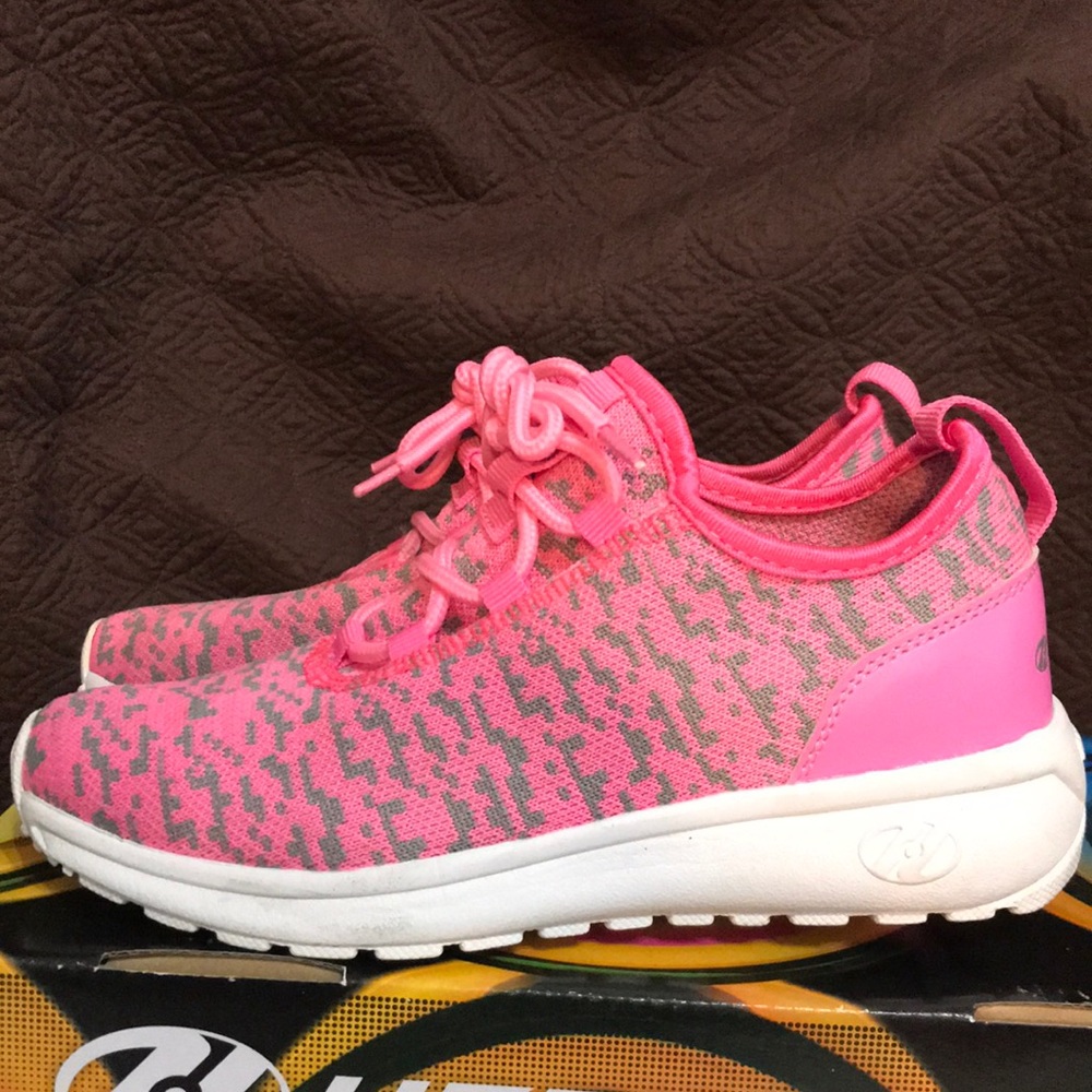 Youth size-4 women’s-5 official Heelys
